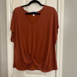 Rust orange top with knot accent